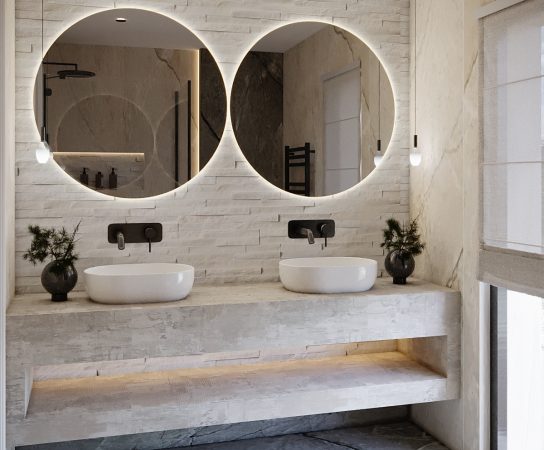Bathroom with floating vanity and twin illuminated circular mirrors, luxury house interior design Solihull in West Midlands