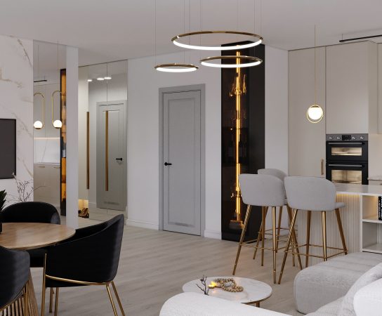 Modern open-plan apartment in Łódź with gold hoop chandeliers, kitchen bar seating, and marble backsplash.
