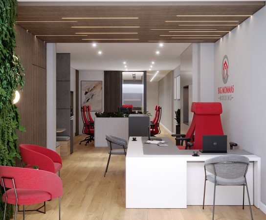 Wide view of a modern office waiting area and reception with a green vertical garden wall, red chairs, and a view into the main workspace.